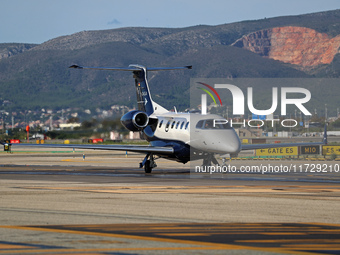 An Embraer Phenom 300 from Padaviation company is on the runway ready to take off from Barcelona airport in Barcelona, Spain, on October 8,...