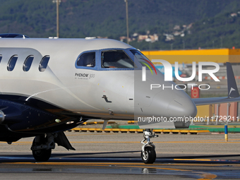 An Embraer Phenom 300 from Padaviation company is on the runway ready to take off from Barcelona airport in Barcelona, Spain, on October 8,...