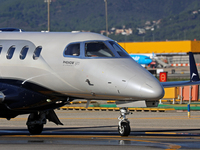 An Embraer Phenom 300 from Padaviation company is on the runway ready to take off from Barcelona airport in Barcelona, Spain, on October 8,...