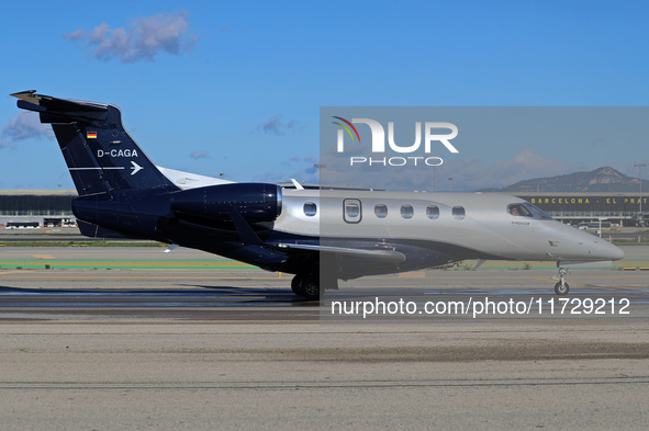 An Embraer Phenom 300 from Padaviation company is on the runway ready to take off from Barcelona airport in Barcelona, Spain, on October 8,...