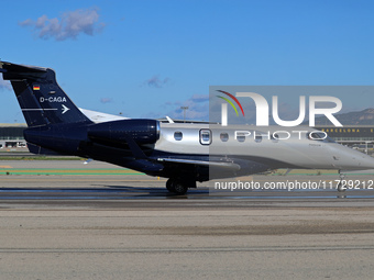 An Embraer Phenom 300 from Padaviation company is on the runway ready to take off from Barcelona airport in Barcelona, Spain, on October 8,...