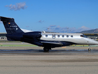 An Embraer Phenom 300 from Padaviation company is on the runway ready to take off from Barcelona airport in Barcelona, Spain, on October 8,...