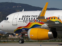 An Airbus A320-232 from Vueling, featuring the ''Born This Way, Fly This Way'' livery, is on the runway after landing at Barcelona El Prat A...