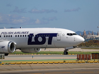 A Boeing 737 MAX 8 from LOT is on the runway after landing at Barcelona El Prat Airport in Barcelona, Spain, on October 8, 2024. (