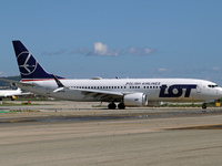 A Boeing 737 MAX 8 from LOT is on the runway after landing at Barcelona El Prat Airport in Barcelona, Spain, on October 8, 2024. (