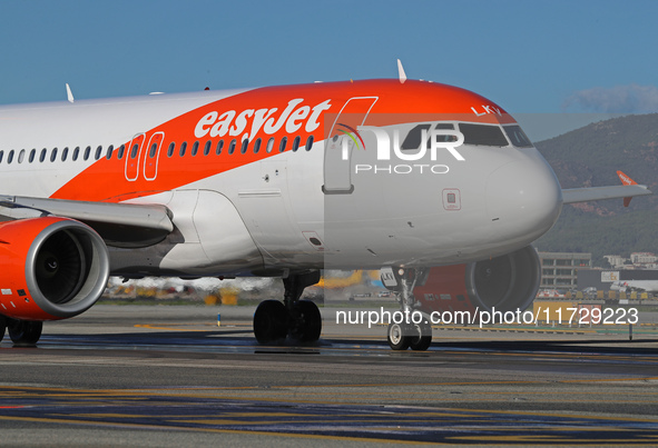 An Airbus A319-111 from easyJet is on the runway ready to take off from Barcelona airport in Barcelona, Spain, on October 8, 2024. 