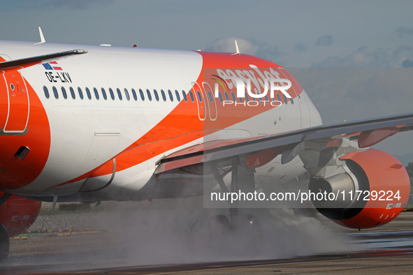 An Airbus A319-111 from easyJet is on the runway ready to take off from Barcelona airport in Barcelona, Spain, on October 8, 2024. 