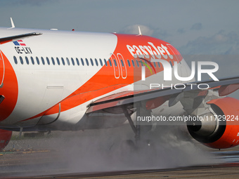 An Airbus A319-111 from easyJet is on the runway ready to take off from Barcelona airport in Barcelona, Spain, on October 8, 2024. (