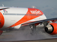 An Airbus A319-111 from easyJet is on the runway ready to take off from Barcelona airport in Barcelona, Spain, on October 8, 2024. (