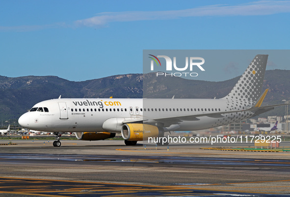 An Airbus A320-232 from Vueling is on the runway ready to take off from Barcelona airport in Barcelona, Spain, on October 8, 2024. 