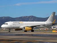 An Airbus A320-232 from Vueling is on the runway ready to take off from Barcelona airport in Barcelona, Spain, on October 8, 2024. (