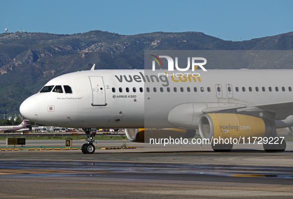 An Airbus A320-232 from Vueling is on the runway ready to take off from Barcelona airport in Barcelona, Spain, on October 8, 2024. 