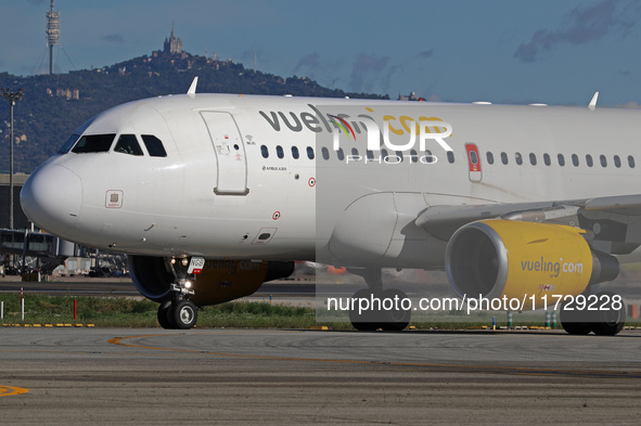 An Airbus A319-112 from Vueling is on the runway ready to take off from Barcelona airport in Barcelona, Spain, on October 8, 2024. 