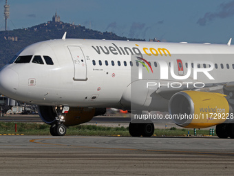 An Airbus A319-112 from Vueling is on the runway ready to take off from Barcelona airport in Barcelona, Spain, on October 8, 2024. (