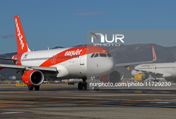 An Airbus A320-214 from easyJet is on the runway ready to take off from Barcelona airport in Barcelona, Spain, on October 8, 2024. 