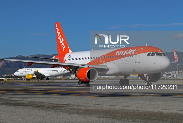 An Airbus A320-214 from easyJet is on the runway ready to take off from Barcelona airport in Barcelona, Spain, on October 8, 2024. 