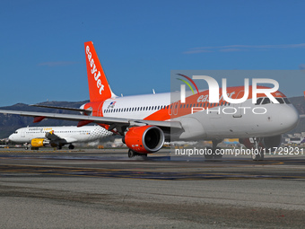 An Airbus A320-214 from easyJet is on the runway ready to take off from Barcelona airport in Barcelona, Spain, on October 8, 2024. (