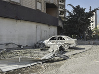 Firefighters extinguish the blaze at the site of overnight Israeli airstrikes that target the neighborhood of Kafaat in Beirut's southern su...