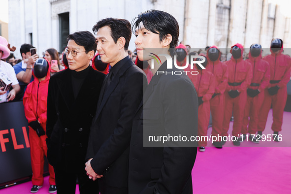 Hwang Dong-hyuk, Lee Jung-jae, and Wi Ha-joon attend the photocall for the press conference of Netflix's Squid Game Season 2 at Lucca Comics...