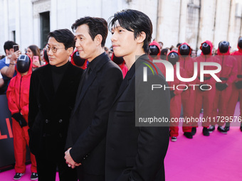 Hwang Dong-hyuk, Lee Jung-jae, and Wi Ha-joon attend the photocall for the press conference of Netflix's Squid Game Season 2 at Lucca Comics...