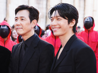 Lee Jung-jae and Wi Ha-joon attend the photocall for the press conference of Netflix's Squid Game Season 2 at Lucca Comics & Games in Lucca,...