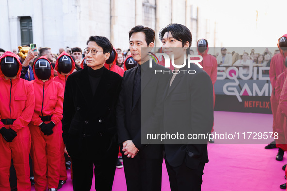 Hwang Dong-hyuk, Lee Jung-jae, and Wi Ha-joon attend the photocall for the press conference of Netflix's Squid Game Season 2 at Lucca Comics...