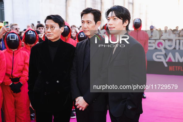 Hwang Dong-hyuk, Lee Jung-jae, and Wi Ha-joon attend the photocall for the press conference of Netflix's Squid Game Season 2 at Lucca Comics...