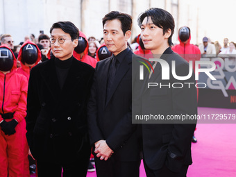 Hwang Dong-hyuk, Lee Jung-jae, and Wi Ha-joon attend the photocall for the press conference of Netflix's Squid Game Season 2 at Lucca Comics...