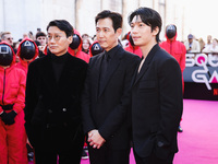 Hwang Dong-hyuk, Lee Jung-jae, and Wi Ha-joon attend the photocall for the press conference of Netflix's Squid Game Season 2 at Lucca Comics...