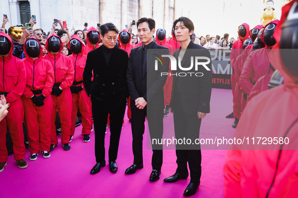 Hwang Dong-hyuk, Lee Jung-jae, and Wi Ha-joon attend the photocall for the press conference of Netflix's Squid Game Season 2 at Lucca Comics...