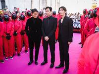 Hwang Dong-hyuk, Lee Jung-jae, and Wi Ha-joon attend the photocall for the press conference of Netflix's Squid Game Season 2 at Lucca Comics...