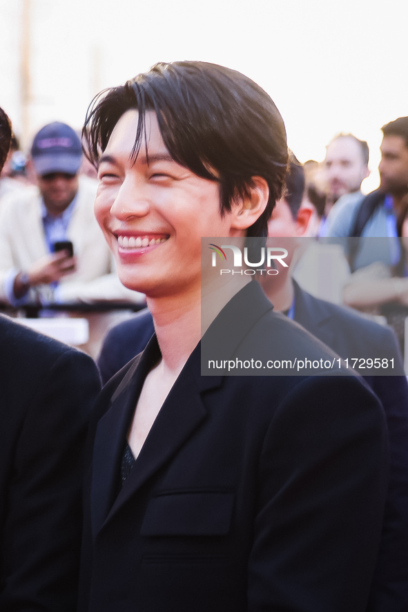 Wi Ha-joon attends the photocall for the press conference of Netflix's Squid Game Season 2 at Lucca Comics & Games in Lucca, Italy, on Octob...