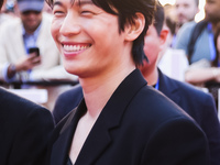 Wi Ha-joon attends the photocall for the press conference of Netflix's Squid Game Season 2 at Lucca Comics & Games in Lucca, Italy, on Octob...