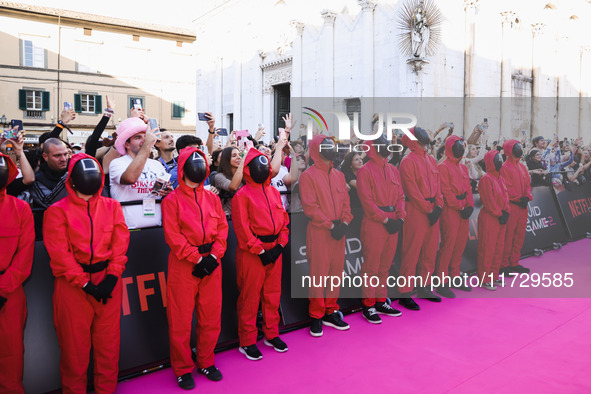 A cosplayer attends the photocall for the press conference of Netflix's Squid Game Season 2 at Lucca Comics & Games in Lucca, Italy, on Octo...