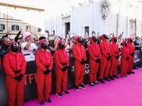 A cosplayer attends the photocall for the press conference of Netflix's Squid Game Season 2 at Lucca Comics & Games in Lucca, Italy, on Octo...