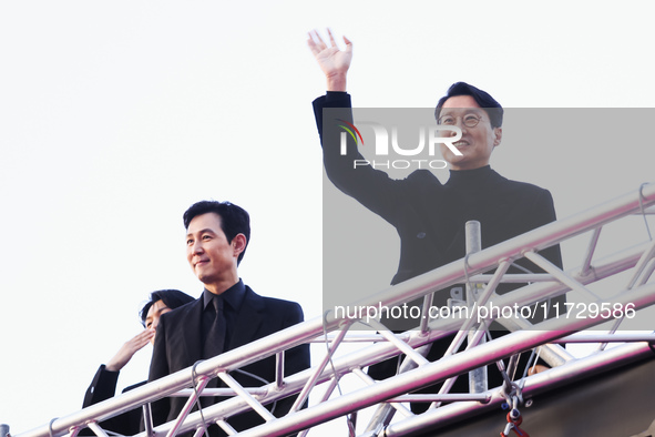 Lee Jung-jae and Hwang Dong-hyuk attend the photocall for the press conference of Netflix's Squid Game Season 2 at Lucca Comics & Games in L...