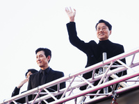 Lee Jung-jae and Hwang Dong-hyuk attend the photocall for the press conference of Netflix's Squid Game Season 2 at Lucca Comics & Games in L...