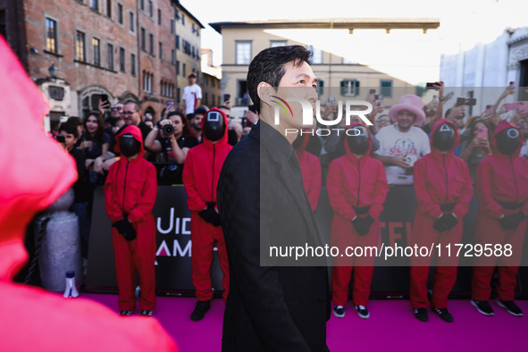 Lee Jung-jae attends the photocall for the press conference of Netflix's Squid Game Season 2 at Lucca Comics & Games in Lucca, Italy, on Oct...