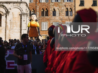 A cosplayer attends the photocall for the press conference of Netflix's Squid Game Season 2 at Lucca Comics & Games in Lucca, Italy, on Octo...