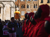 A cosplayer attends the photocall for the press conference of Netflix's Squid Game Season 2 at Lucca Comics & Games in Lucca, Italy, on Octo...