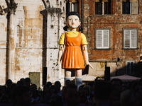 A cosplayer attends the photocall for the press conference of Netflix's Squid Game Season 2 at Lucca Comics & Games in Lucca, Italy, on Octo...