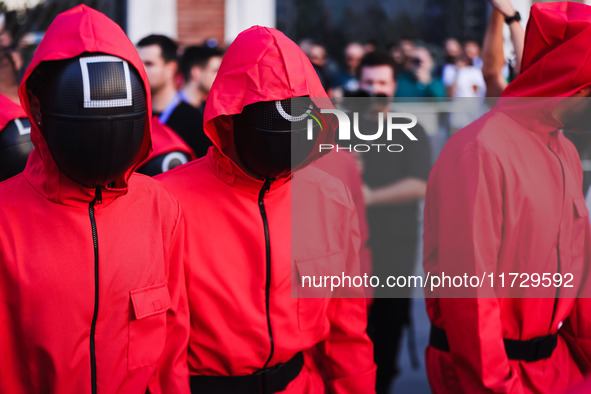 A cosplayer attends the photocall for the press conference of Netflix's Squid Game Season 2 at Lucca Comics & Games in Lucca, Italy, on Octo...