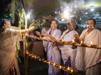 Elderly women at Pramod Talukdar Memorial Old Age Home burn sparkler crackers as they celebrate Diwali in Guwahati, India, on November 1, 20...