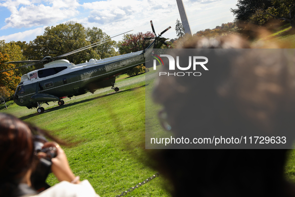 Seen beyond members of the press, Marine One carrying U.S. President Joe Biden departs the South Lawn of the White House in Washington, D.C....