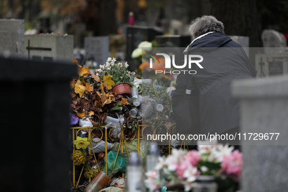 A garbage can is at the Rakowicki Cemetery during preparations for All Saints' Day in Krakow, Poland, on October 30, 2024. November 1 is cel...