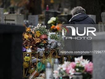 A garbage can is at the Rakowicki Cemetery during preparations for All Saints' Day in Krakow, Poland, on October 30, 2024. November 1 is cel...