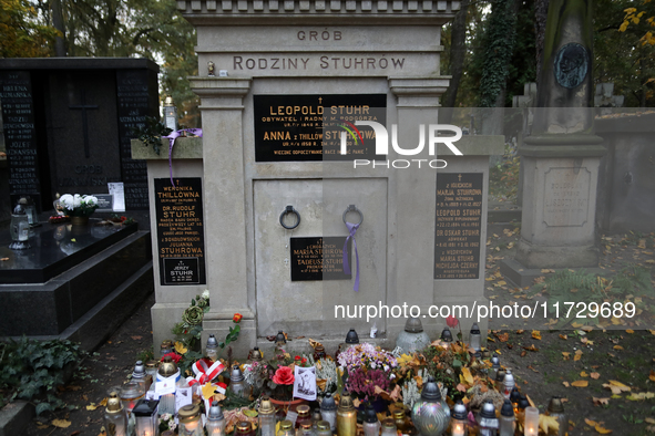 The grave of the Stuhr family at the Rakowicki Cemetery is prepared for All Saints' Day on October 30, 2024, in Krakow, Poland. November 1 i...