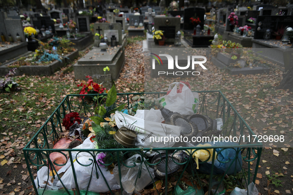 A garbage can is at the Rakowicki Cemetery during preparations for All Saints' Day in Krakow, Poland, on October 30, 2024. November 1 is cel...