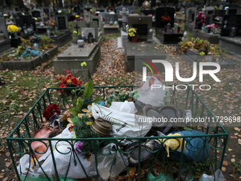 A garbage can is at the Rakowicki Cemetery during preparations for All Saints' Day in Krakow, Poland, on October 30, 2024. November 1 is cel...