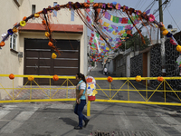 A view of an arch in Santiago Zapotitlan, Tlahuac, in Mexico City, on November 1, 2024, leads towards the community cemetery where dozens of...